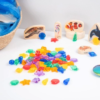 Priehľadné farebné mušle